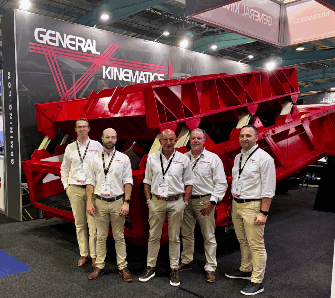 The GK Africa team standing in front of an STM-SCREEN™